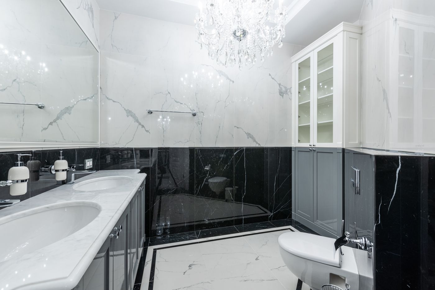 Guest bath renovation — Marble tile and updated lighting